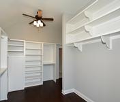 Master Closet Built Ins in Home built by Waterford Homes